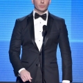Host Pitbull speaks onstage at the 2014 American Music Awards
