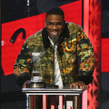 ATLANTA, GEORGIA - OCTOBER 01: Nelly receives the 'I Am Hip Hop' award onstage during the 2021 BET Hip Hop Awards at Cobb Energy Performing Arts Center on October 01, 2021 in Atlanta, Georgia. (Photo by Bennett Raglin/Getty Images for BET)