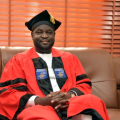 sitting-robed-in-VC-office